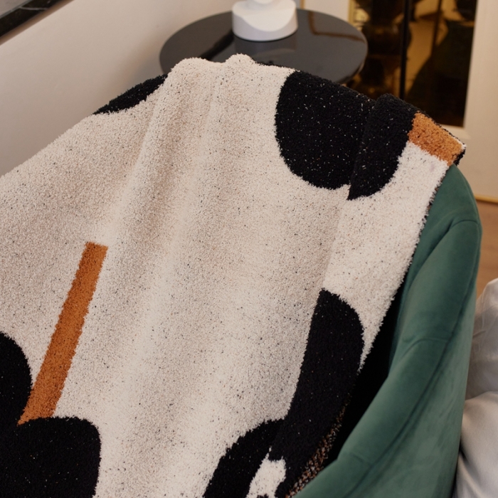 91家纺网 家纺一手货源 找家纺 安莱 设计师太阳花A类半边绒针织毯子沙发办公室午睡毯秋冬 向阳花