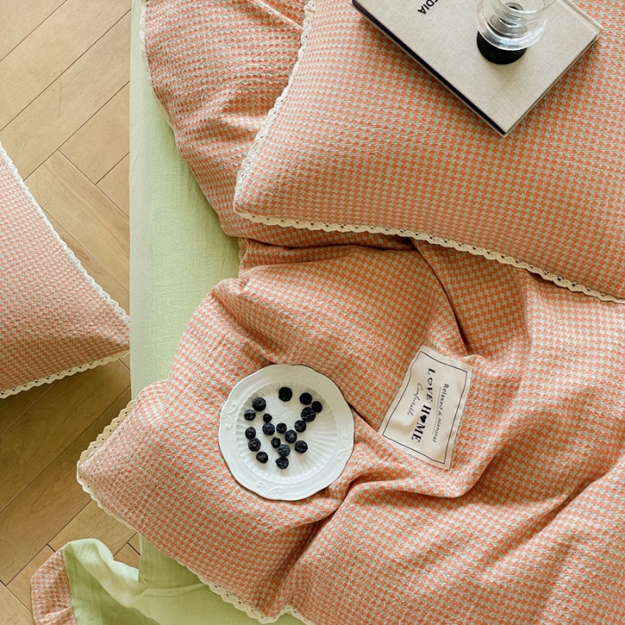 91家纺网 家纺一手货源 找家纺 圆岛 2022新款色织小提花花边款全棉水洗棉四件套 橘粉拼绿