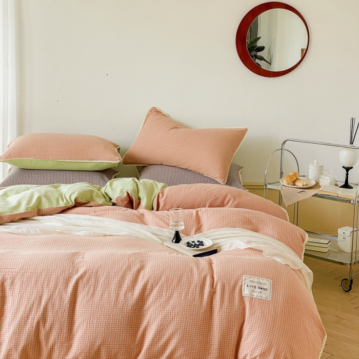 91家纺网 家纺一手货源 找家纺 圆岛 2022新款色织小提花花边款全棉水洗棉四件套 橘粉拼绿