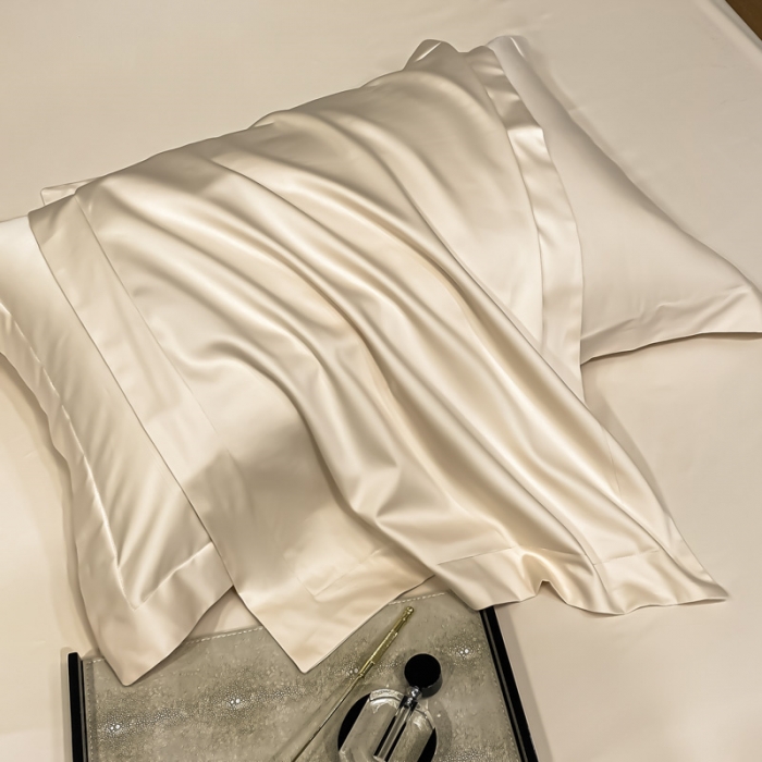 91家纺网 家纺一手货源 找家纺 秀色 2025爆款A类刺绣纯色50支贡缎纯棉单枕套1对 奶昔白