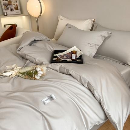 91家纺网 家纺一手货源 找家纺 高级感简约贡缎长绒棉纯色双拼床上四件套全棉被套奶昔白香槟金