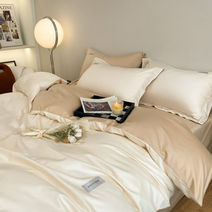 91家纺网 家纺一手货源 找家纺 高级感简约贡缎长绒棉纯色双拼床上四件套全棉被套奶昔白香槟金