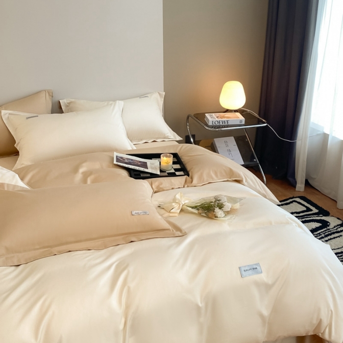 91家纺网 家纺一手货源 找家纺 高级感简约贡缎长绒棉纯色双拼床上四件套全棉被套奶昔白香槟金