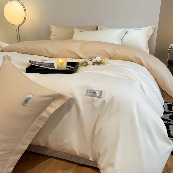 91家纺网 家纺一手货源 找家纺 高级感简约贡缎长绒棉纯色双拼床上四件套全棉被套奶昔白香槟金