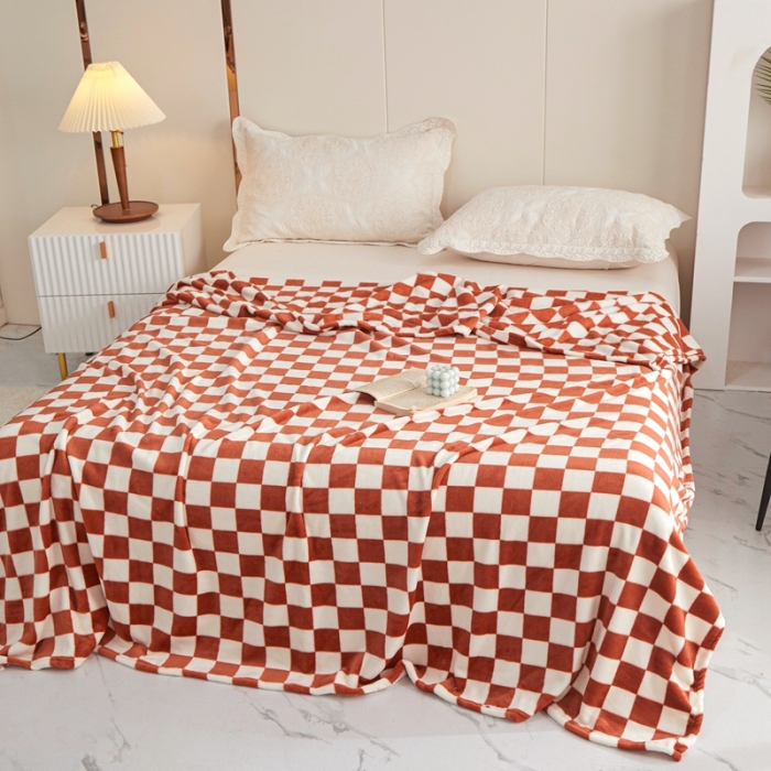 91家纺网 家纺一手货源 找家纺 新丽佳2022新款法兰绒棋盘格毛毯 红咖格