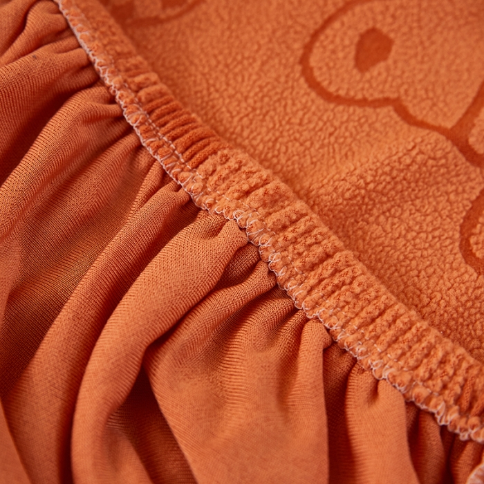 91家纺网 家纺一手货源 找家纺 逐日沙发套 2023新款阳离子雕花沙发套 饼干熊 桔黄