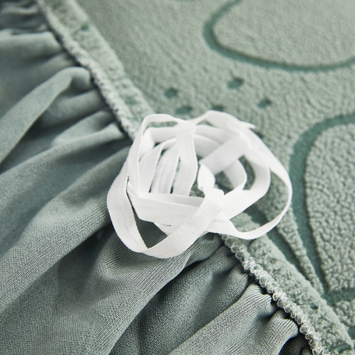 91家纺网 家纺一手货源 找家纺 逐日沙发套 2023新款阳离子雕花沙发套 太阳花 豆绿