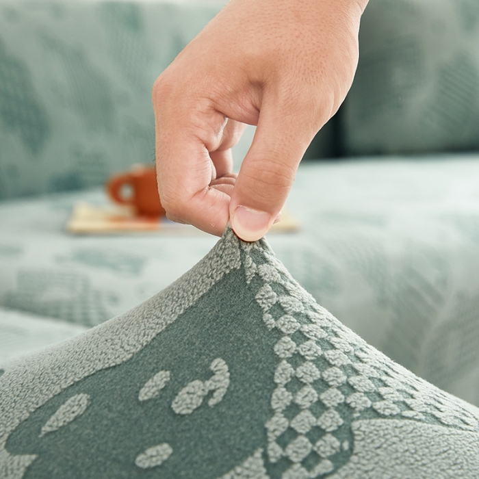 91家纺网 家纺一手货源 找家纺 逐日沙发套 2023新款阳离子雕花沙发套 饼干熊 豆绿