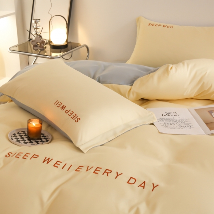 91家纺网 家纺一手货源 找家纺 啊雅家居纯色水洗磨毛亲肤绣花床单款床笠款四套件 奶黄加奶浅灰