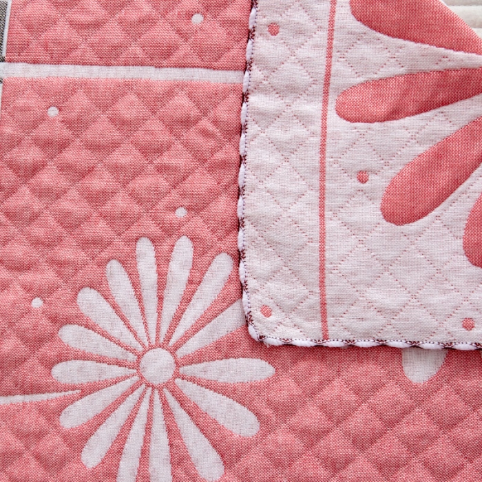 91家纺网 家纺一手货源 找家纺 朴尔 2022新款AB版蜂窝提花锁边立体枕巾 一对装 太阳花-粉