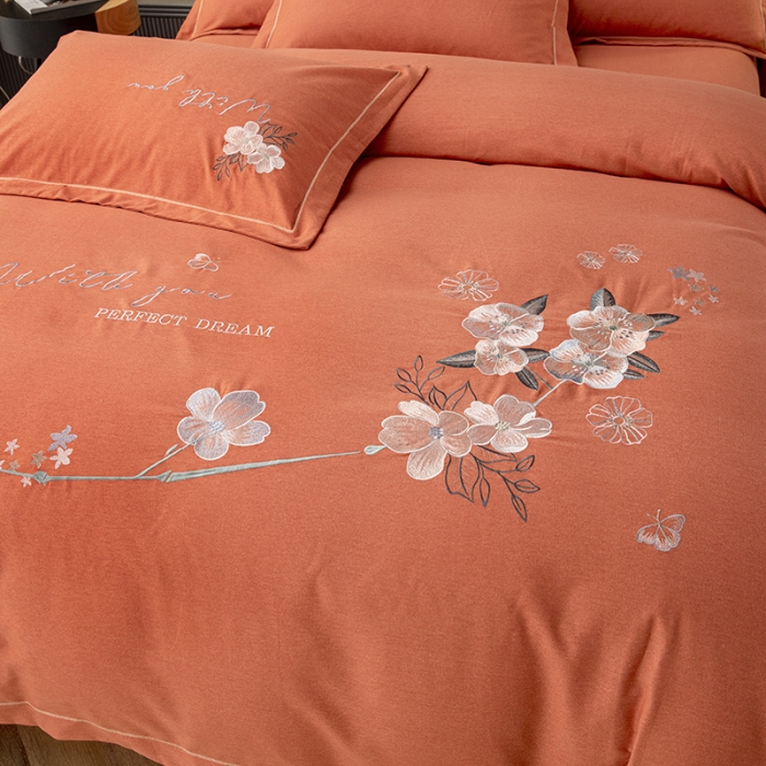 91家纺网 家纺一手货源 找家纺 纽缦 2022新款纯棉加厚纯色绣花款床笠四件套 醉花阴爱马橙