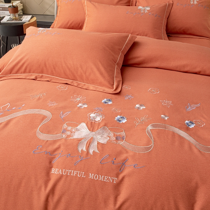 91家纺网 家纺一手货源 找家纺 纽缦 2022新款纯棉加厚纯色绣花款床裙四件套 蝶恋花爱马橙