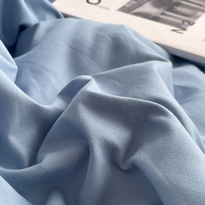 91家纺网 家纺一手货源 找家纺 贝拉梦 2023亲肤棉简约风纯色双拼105g四件套月光雾蓝