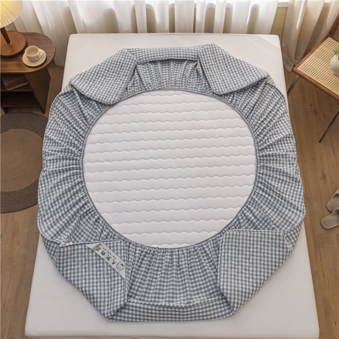 91家纺网 家纺一手货源 找家纺 雪云美新款A类新疆棉花床笠 全棉水洗棉夹棉床笠单  蓝小格