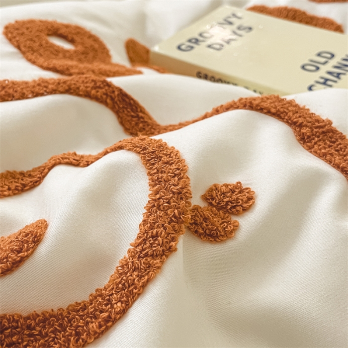 91家纺网 家纺一手货源 找家纺 眠帛家纺 2023新款水洗棉毛巾绣四件套煤球系列 煤球焦糖