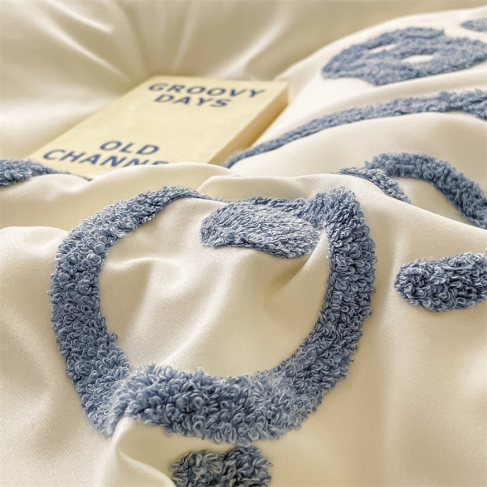 91家纺网 家纺一手货源 找家纺 眠帛家纺 2023新款水洗棉毛巾绣四件套煤球系列 煤球蓝灰