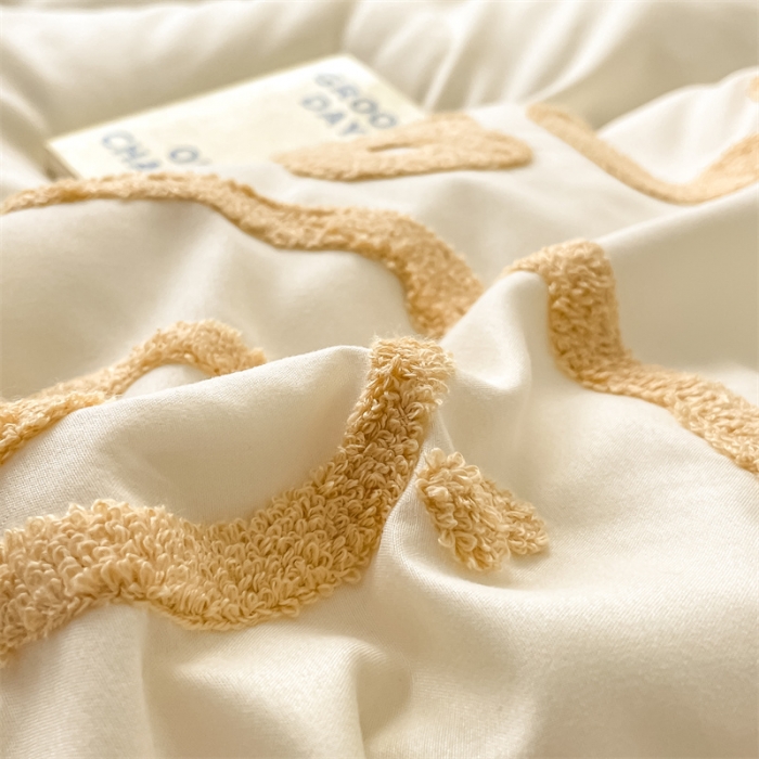 91家纺网 家纺一手货源 找家纺 眠帛家纺 2023新款水洗棉毛巾绣四件套煤球系列 煤球奶黄