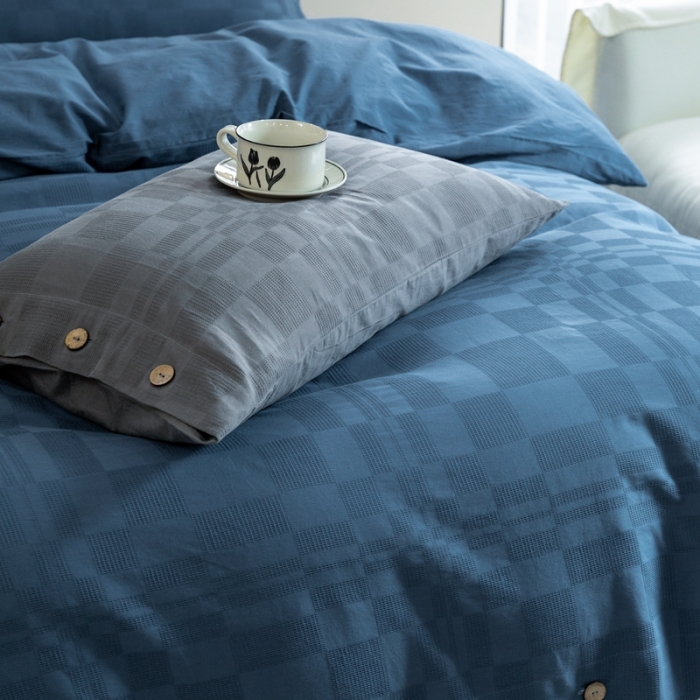 91家纺网 家纺一手货源 找家纺 棉邦 2023新款40支华夫格大提花纽扣款四件套 深蓝