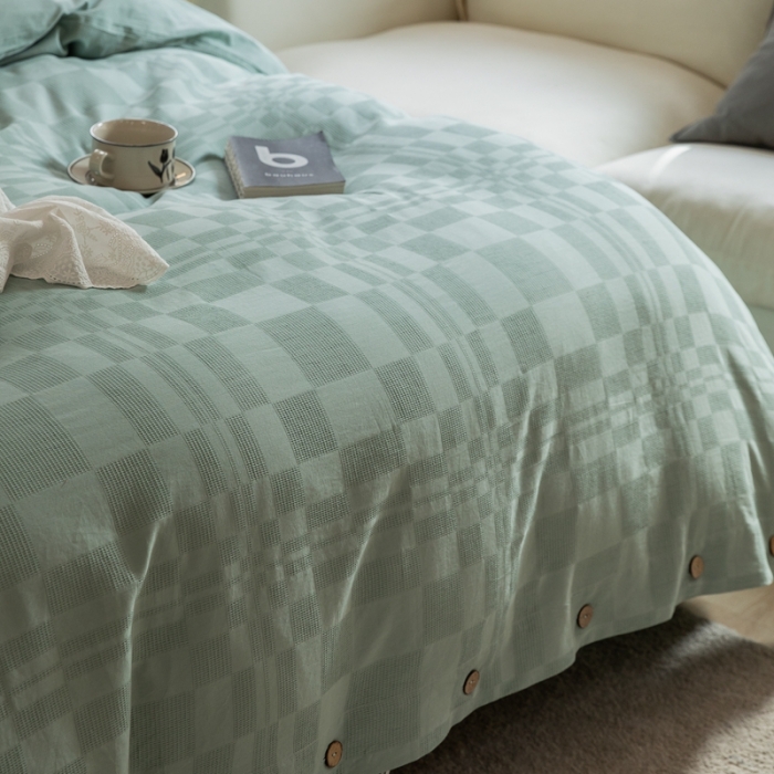 91家纺网 家纺一手货源 找家纺 棉邦 2023新款40支华夫格大提花纽扣款四件套 水绿