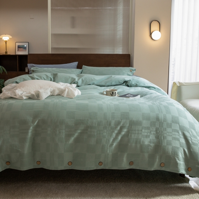 91家纺网 家纺一手货源 找家纺 棉邦 2023新款40支华夫格大提花纽扣款四件套 水绿