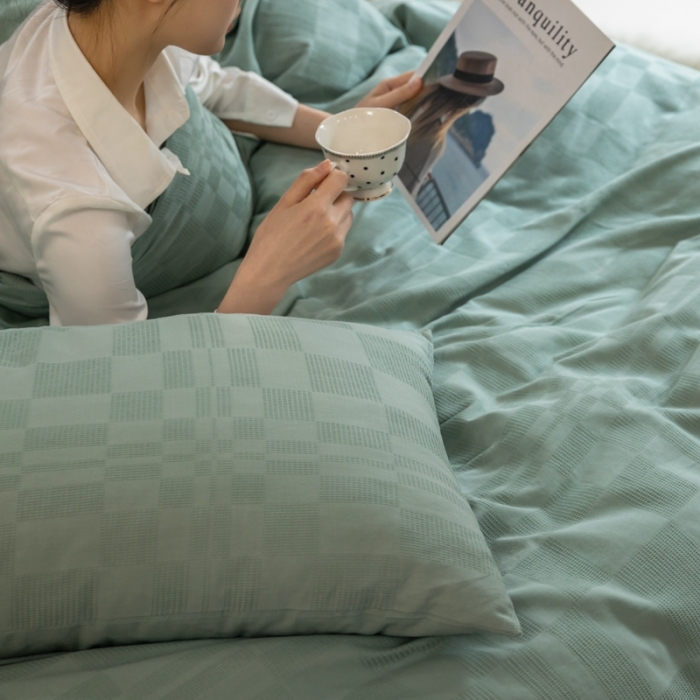 91家纺网 家纺一手货源 找家纺 棉邦 2023新款40支华夫格大提花纽扣款四件套 水绿