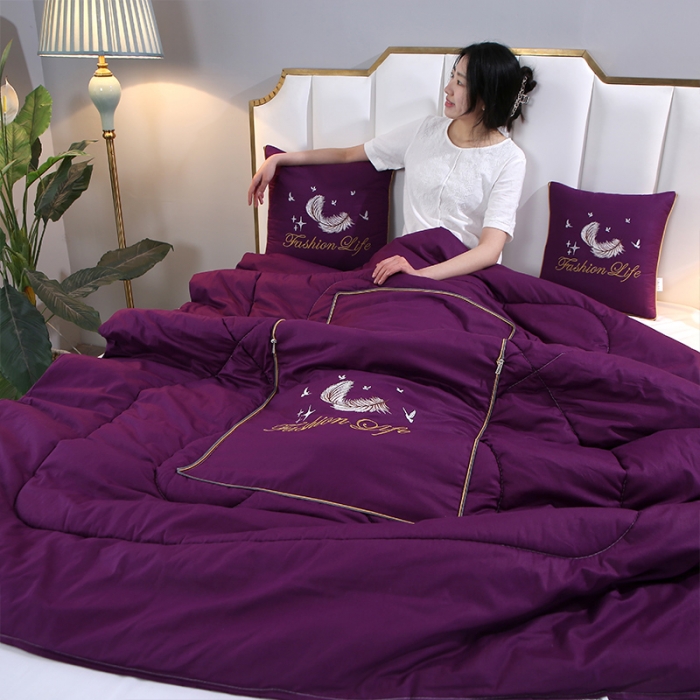 91家纺网 家纺一手货源 找家纺 照世2023新款13372全棉简约羽毛系列抱枕被 紫色