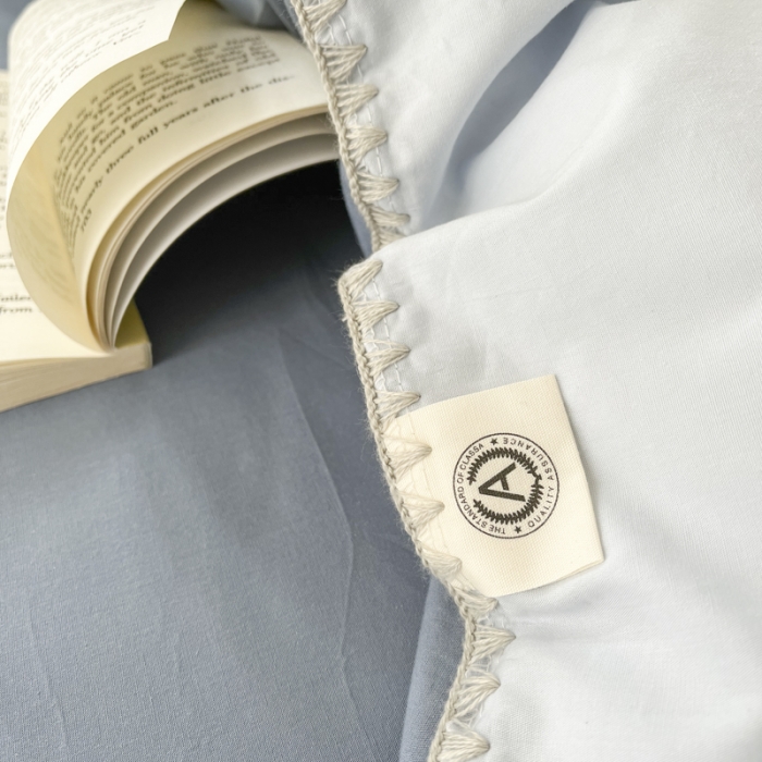 91家纺网 家纺一手货源 找家纺 蜜柚 2024新款A类全棉40支纯色纽扣款水洗棉四件套 海盐兰