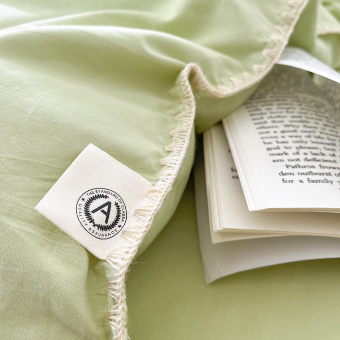 91家纺网 家纺一手货源 找家纺 蜜柚 2024新款A类全棉40支纯色纽扣款水洗棉四件套 豌豆绿