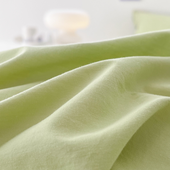 91家纺网 家纺一手货源 找家纺 蜜柚 2024新款A类全棉40支纯色纽扣款水洗棉四件套 豌豆绿