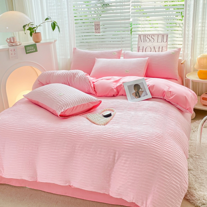 91家纺网 家纺一手货源 找家纺 红日子 2023新款韩版泡泡纱提花水洗棉纯色四件套 泡泡纱-樱花粉