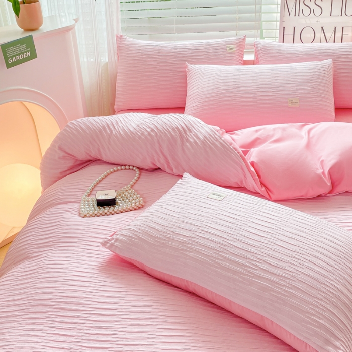 91家纺网 家纺一手货源 找家纺 红日子 2023新款韩版泡泡纱提花水洗棉纯色四件套 泡泡纱-樱花粉