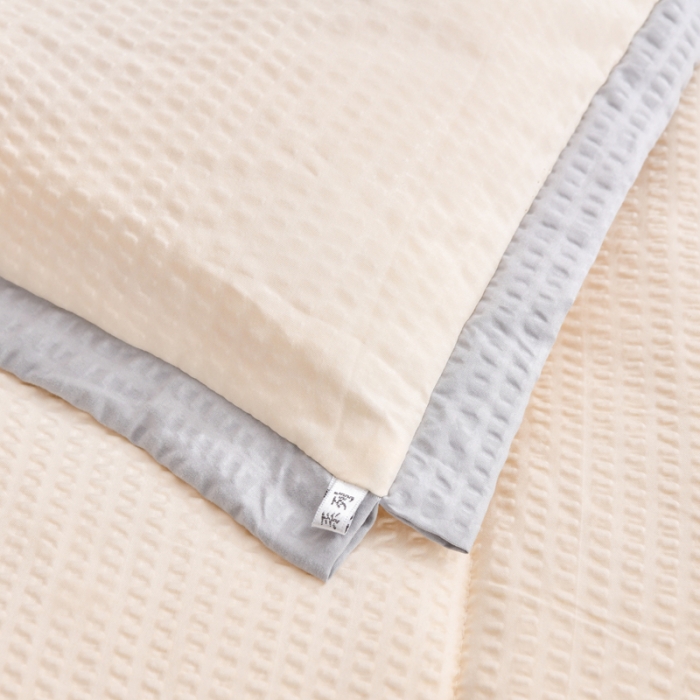 91家纺网 家纺一手货源 找家纺 啊雅家居 2025新款华夫格泡泡纱大豆被 泡泡纱-暖心黄