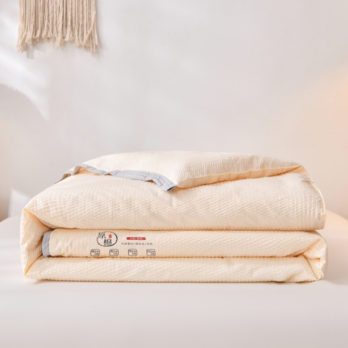 91家纺网 家纺一手货源 找家纺 啊雅家居 2025新款华夫格泡泡纱大豆被 泡泡纱-暖心黄