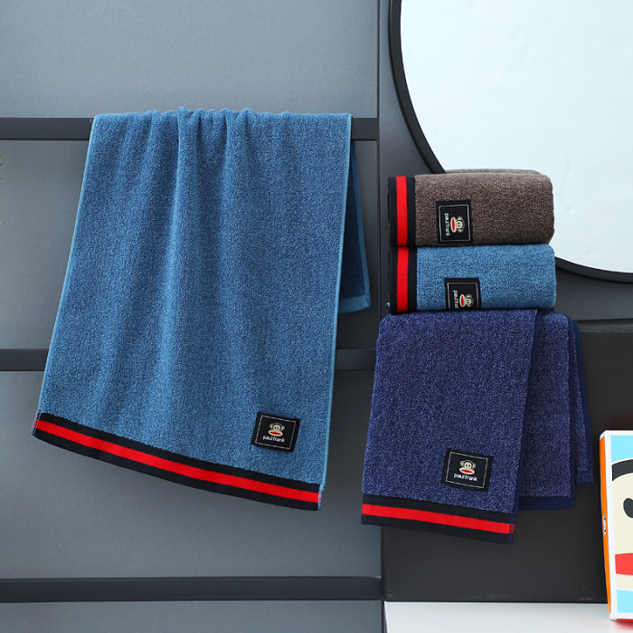 91家纺网 家纺一手货源 找家纺 大嘴猴全棉AB纱毛巾商务布标猴 毛巾咖色33*72cm