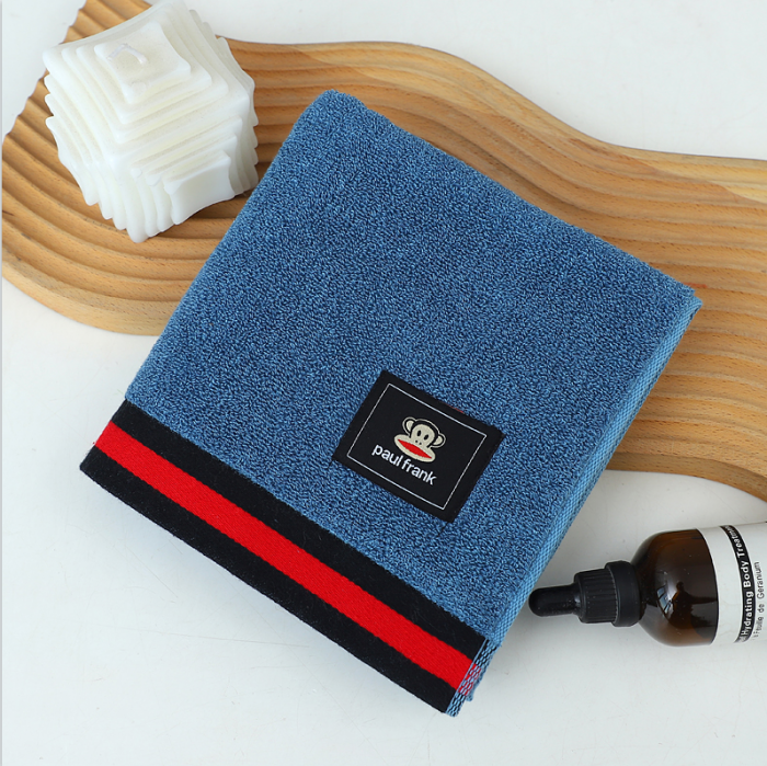 91家纺网 家纺一手货源 找家纺 大嘴猴全棉AB纱毛巾商务布标猴 毛巾咖色33*72cm