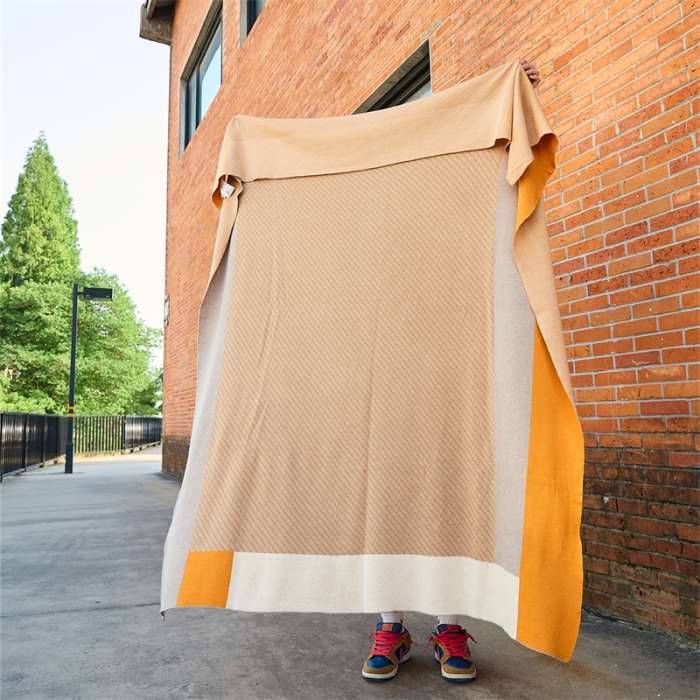 91家纺网 家纺一手货源 找家纺 暖绵绵家纺 2025新款松逸格系列羊毛混纺盖毯毛毯 黄色