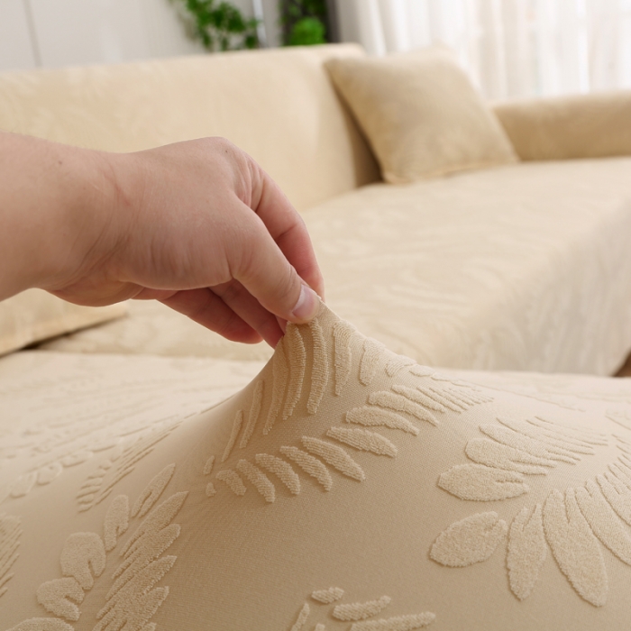 91家纺网 家纺一手货源 找家纺 兴妮雅 2023新款大树叶防水弹力立体浮雕提花贵妃沙发坐垫套 米黄