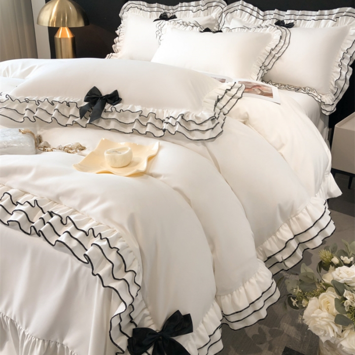 91家纺网 家纺一手货源 找家纺 (总) 乐卧家居 2026新款学院风多层荷叶边蝴蝶结四件套-多巴胺系列