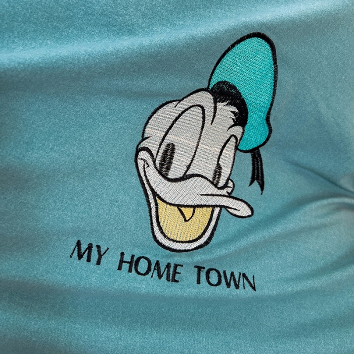 91家纺网 家纺一手货源 找家纺 品乐家纺 2023新款全棉磨毛迪士尼刺绣系列床笠+枕套 唐老鸭-兰