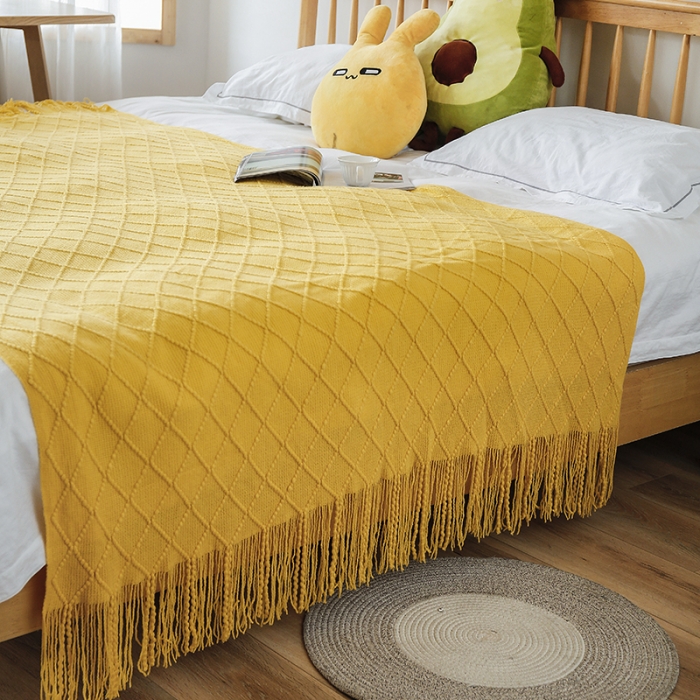 91家纺网 家纺一手货源 找家纺 2025新款针织毯沙发毯盖毯流苏薄毯子 明黄