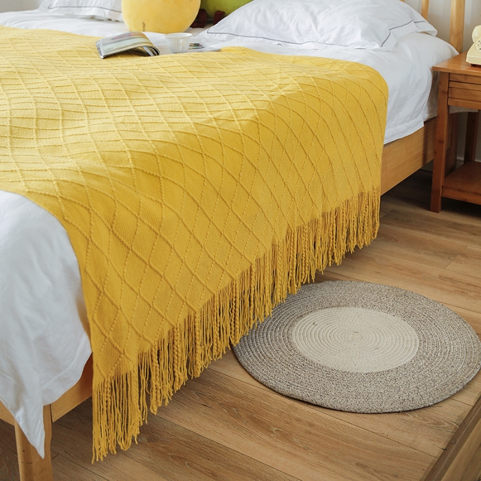 91家纺网 家纺一手货源 找家纺 2025新款针织毯沙发毯盖毯流苏薄毯子 明黄