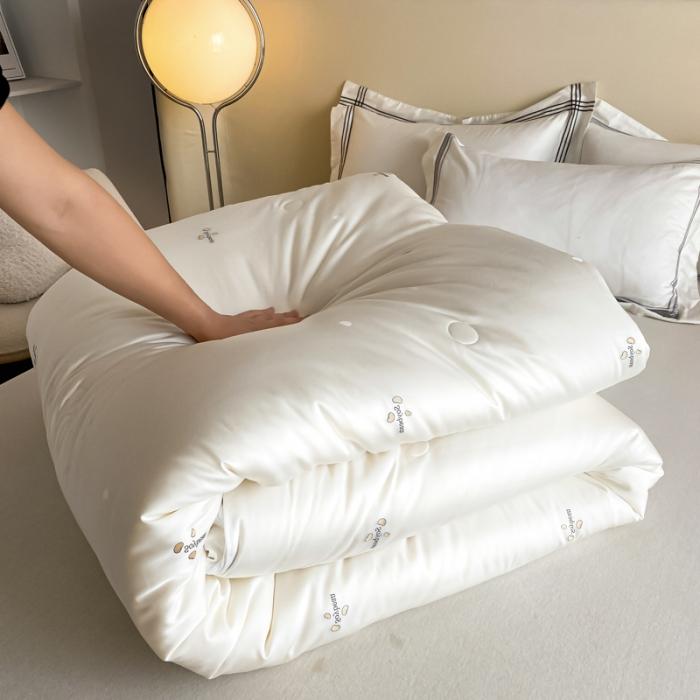 91家纺网 家纺一手货源 找家纺 新款天丝棉大提花蚕丝大豆被蚕丝二合一拉链子母被芯剪花大豆蚕丝被子