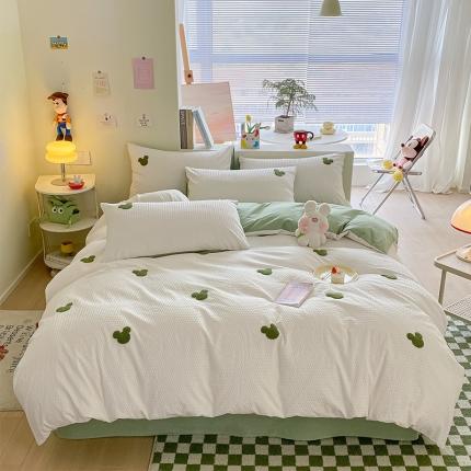 91家纺网 家纺一手货源 找家纺 眠帛家居 2024新款华夫格迪士尼米奇毛巾绣系列 米奇绿