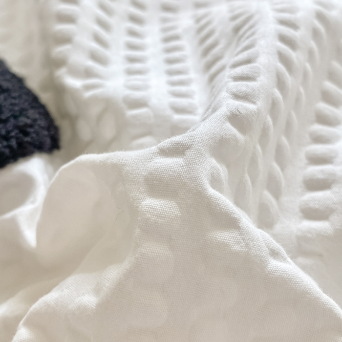 91家纺网 家纺一手货源 找家纺 眠帛家居 2024新款华夫格迪士尼米奇毛巾绣系列 米奇浅灰