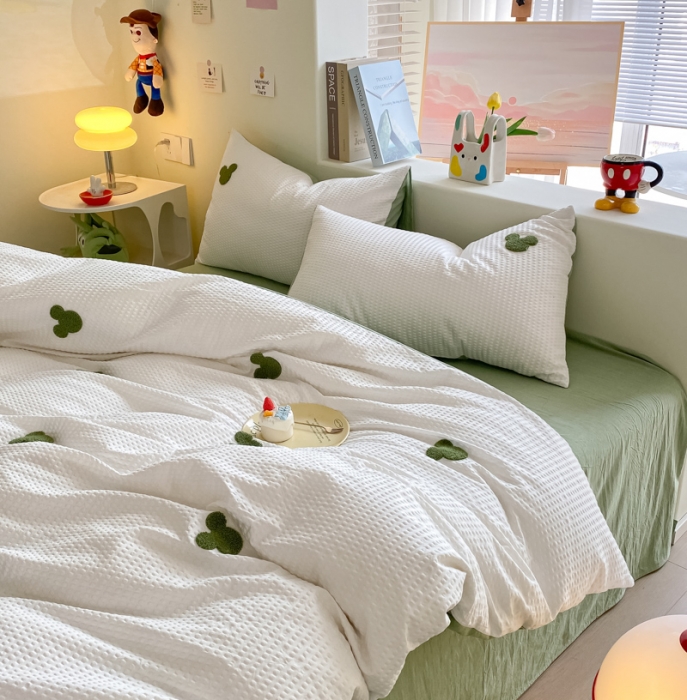 91家纺网 家纺一手货源 找家纺 眠帛家居 2024新款华夫格迪士尼米奇毛巾绣系列 米奇绿