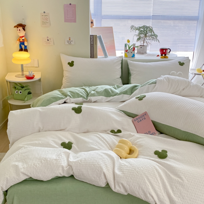 91家纺网 家纺一手货源 找家纺 眠帛家居 2024新款华夫格迪士尼米奇毛巾绣系列 米奇绿