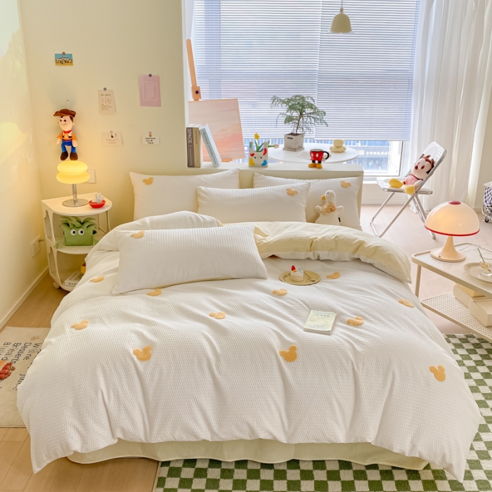 91家纺网 家纺一手货源 找家纺 眠帛家居 2024新款华夫格迪士尼米奇毛巾绣系列 米奇黄