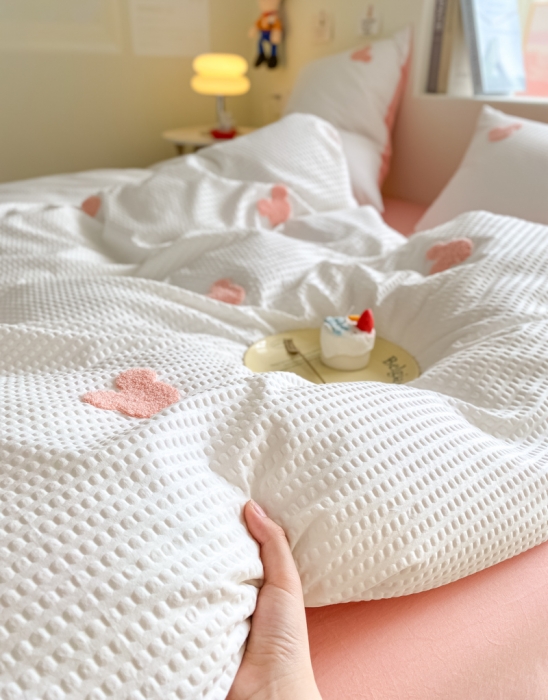 91家纺网 家纺一手货源 找家纺 眠帛家居 2024新款华夫格迪士尼米奇毛巾绣系列 米奇粉