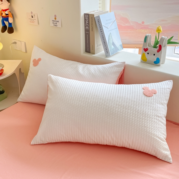 91家纺网 家纺一手货源 找家纺 眠帛家居 2024新款华夫格迪士尼米奇毛巾绣系列 米奇粉