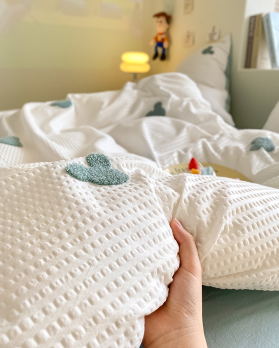 91家纺网 家纺一手货源 找家纺 眠帛家居 2024新款华夫格迪士尼米奇毛巾绣系列 米奇繁星蓝